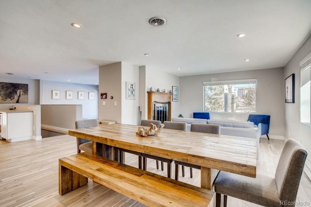 Harrison Street Denver open concept kitchen remodel with relocated staircase